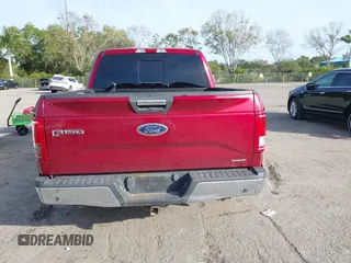 2015 Ford F-150 XLT with VIN 1FTEW1C87FKD70547, listed as a IAAI auction lot 41451841 with 151,596 mi miles and . Bid and sale history available at carsss.com. Image 17.