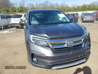 2020 Honda Pilot EX-L z VIN 5FNYF6H52LB039456, wystawiony jako IAAI lot #41831333 z przebiegiem 118 337 mil mil oraz . Historia ofert i sprzedaży dostępna na DreamBid. Obrazek 1.