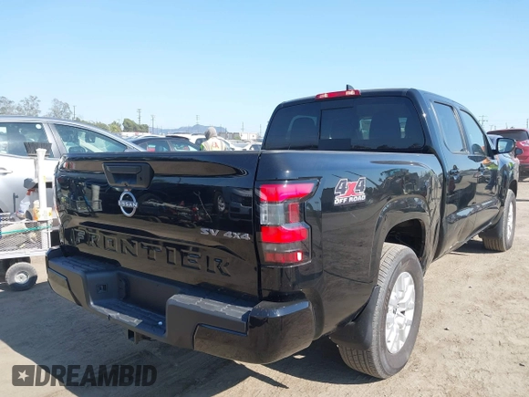 2024 Nissan Frontier SV with VIN 1N6ED1FK2RN603585, listed as a IAAI auction lot 42771501 with 8,818 mi miles and . Bid and sale history available at DreamBid. Image 4.