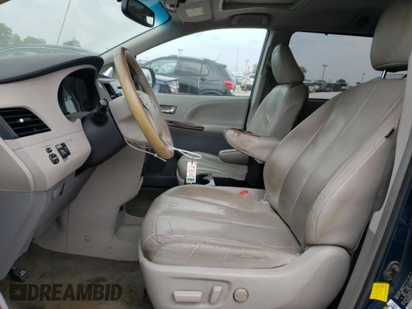 2012 Toyota Sienna XLE AAS with VIN 5TDYK3DC7CS216061, listed as a Copart auction lot 60596715 with 112,713 mi miles and Salvage title. Bid and sale history available at DreamBid. Image 7.