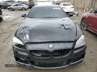 2014 BMW 6 Series 650i z VIN WBA6B2C5XED128959, wystawiony jako Copart lot #50816635 z przebiegiem 146 875 mil mil oraz Szkoda całkowita • Salvage title. Historia ofert i sprzedaży dostępna na DreamBid. Obrazek 5.