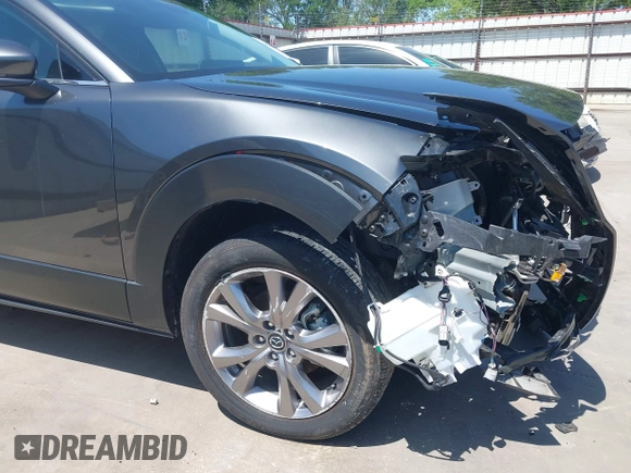 2022 Mazda CX-30 S Premium with VIN 3MVDMBDL5NM416649, listed as a IAAI auction lot 41990745 with 13,923 mi miles and . Bid and sale history available at DreamBid. Image 18.