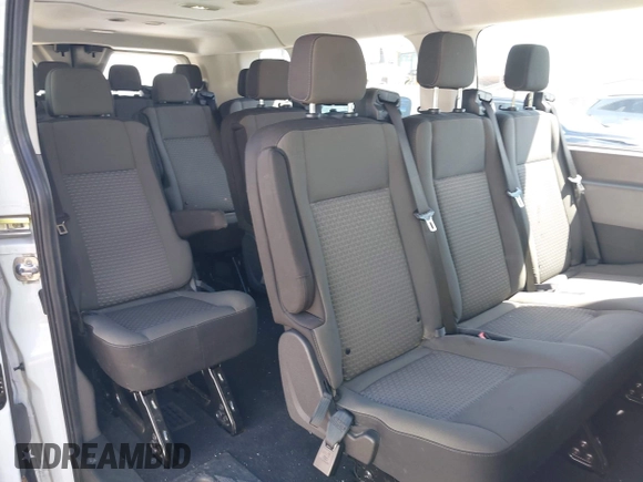 2024 Ford Transit Passenger XL z VIN 1FBAX2Y86RKA08969, wystawiony jako IAAI lot #42265593 z przebiegiem 27 690 mil mil oraz . Historia ofert i sprzedaży dostępna na DreamBid. Obrazek 8.