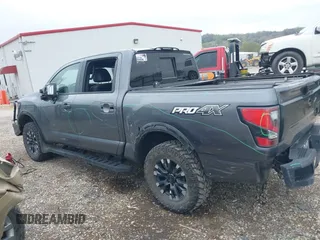 2021 Nissan Titan Pro-4X with VIN 1N6AA1ED3MN531332, listed as a IAAI auction lot 41918065 with 125,323 mi miles and . Bid and sale history available at DreamBid. Image 14.
