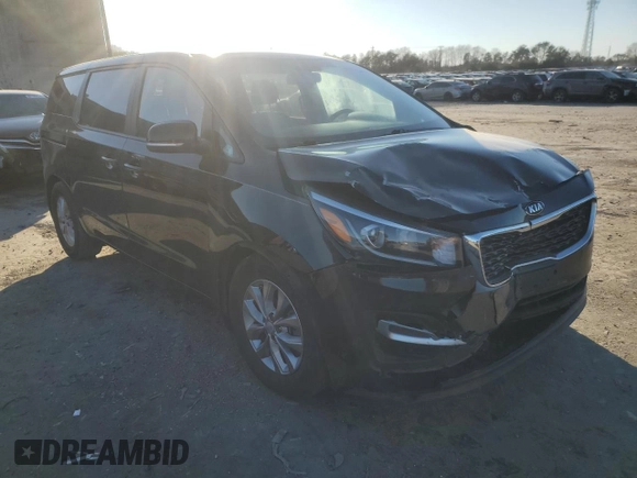 2021 Kia Sedona LX with VIN KNDMB5C12M6668527, listed as a Copart auction lot 84026154 with 165,585 mi miles and Salvage Title. Bid and sale history available at carsss.com. Image 4.