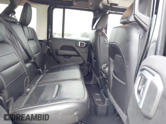 2023 Jeep Wrangler Sahara z VIN 1C4JJXP6XPW556327, wystawiony jako IAAI lot #41784532 z przebiegiem 39 918 mil mil oraz . Historia ofert i sprzedaży dostępna na DreamBid. Obrazek 8.