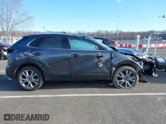 2022 Mazda CX-30 S Premium with VIN 3MVDMBDL9NM403273, listed as a IAAI auction lot 41607227 with Not Provided miles and . Bid and sale history available at carsss.com. Image 14.