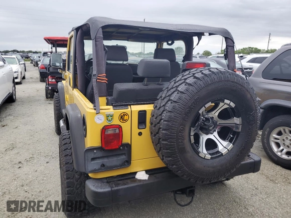 2002 Jeep Wrangler Sport with VIN 1J4FA49S12P746058, listed as a Copart auction lot 75060604 with Not Provided miles and Non Repairable. Bid and sale history available at carsss.com. Image 6.