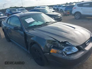 2003 Ford Mustang Standard z VIN 1FAFP40463F341216, wystawiony jako IAAI lot #42601357 z przebiegiem 145 520 mil mil oraz . Historia ofert i sprzedaży dostępna na DreamBid. Obrazek 6.