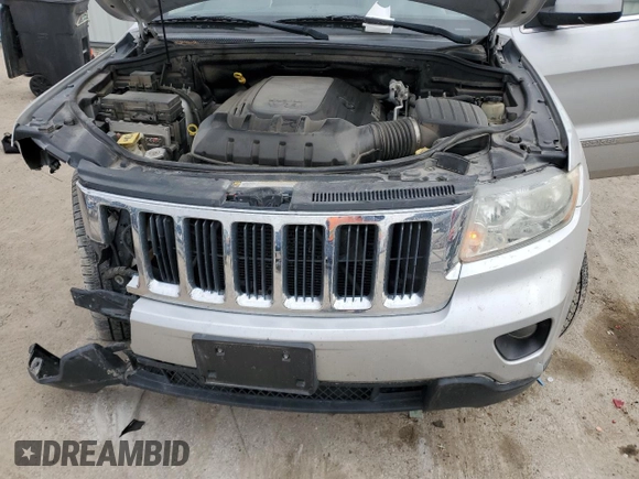 2011 Jeep Grand Cherokee 70th Anniversary with VIN 1J4RR4GT0BC666579, listed as a Copart auction lot 87322784 with 163,439 mi miles and Salvage Title. Bid and sale history available at carsss.com. Image 13.