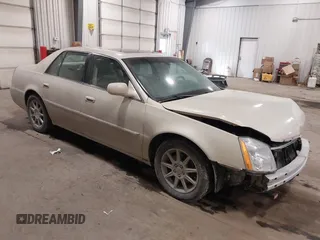 2010 Cadillac DTS 1SC z VIN 1G6KD5EY9AU114214, wystawiony jako IAAI lot #41634580 z przebiegiem 127 000 mil mil oraz . Historia ofert i sprzedaży dostępna na DreamBid. Obrazek 1.