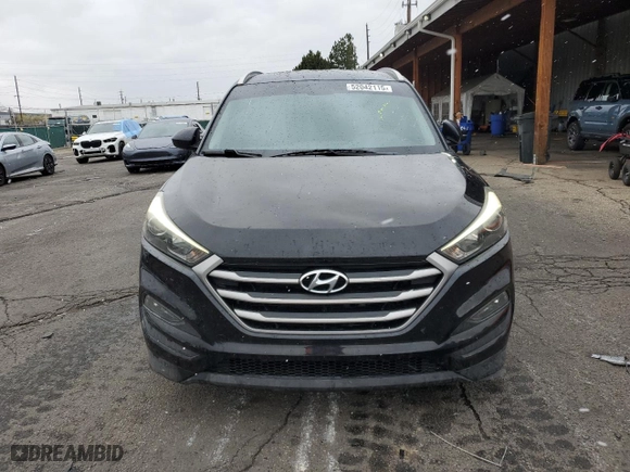 2017 Hyundai Tucson SE with VIN KM8J33A4XHU460779, listed as a Copart auction lot 52042115 with 96,459 mi miles and Salvage Title. Bid and sale history available at carsss.com. Image 5.