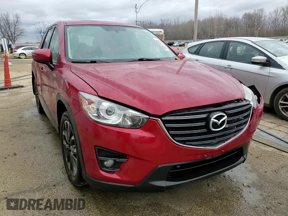 2016 Mazda CX-5 Grand Touring with VIN JM3KE4DY9G0771088, listed as a Copart auction lot 50615495 with 93,221 mi miles and Salvage Title. Bid and sale history available at DreamBid. Image 14.