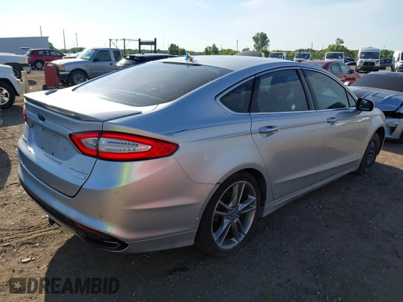 2013 Ford Fusion Titanium with VIN 3FA6P0K92DR200035, listed as a IAAI auction lot 42798129 with 242,831 mi miles and . Bid and sale history available at DreamBid. Image 4.