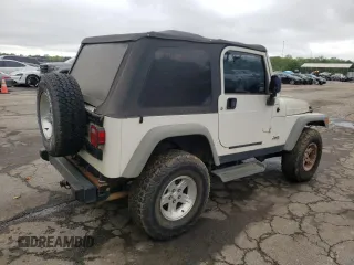 2005 Jeep Wrangler Sport z VIN 1J4FA49S55P334844, wystawiony jako Copart lot #52026835 z przebiegiem 209 216 mil mil oraz Czysty tytuł • Clean title. Historia ofert i sprzedaży dostępna na DreamBid. Obrazek 3.