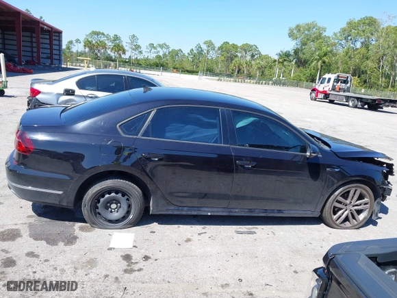 2018 Volkswagen Passat 2.0T S with VIN 1VWAA7A33JC009677, listed as a IAAI auction lot 41796723 with 63,151 mi miles. Bid and sale history available at carsss.com. Image 14.