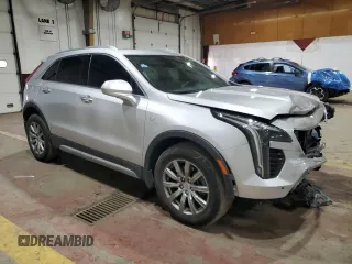 2020 Cadillac XT4 AWD Premium Luxury with VIN 1GYFZDR40LF055380, listed as a Copart auction lot 43933755 with 54,646 mi miles and Salvage Title. Bid and sale history available at DreamBid. Image 4.