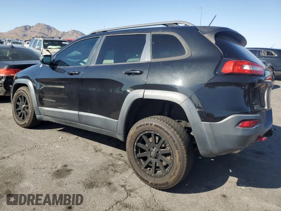 2015 Jeep Cherokee Trailhawk with VIN 1C4PJMBS8FW699319, listed as a Copart auction lot 61612245 with 173,581 mi miles and Clean title. Bid and sale history available at DreamBid. Image 2.