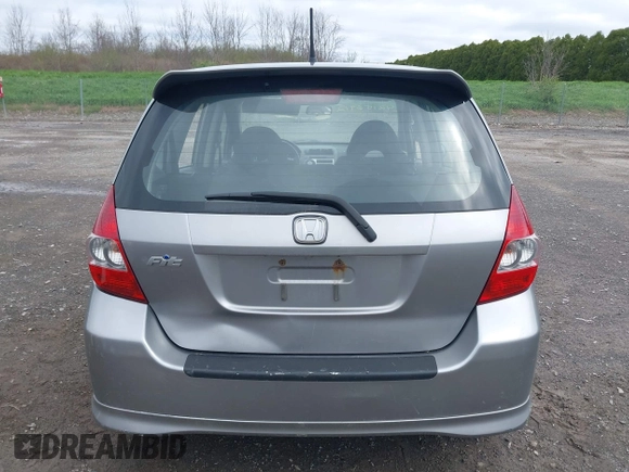 2007 Honda Fit Sport z VIN JHMGD38687S017199, wystawiony jako IAAI lot #42156912 z przebiegiem 194 685 mil mil oraz . Historia ofert i sprzedaży dostępna na DreamBid. Obrazek 17.