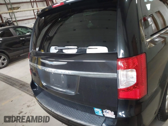 2012 Chrysler Town & Country Touring L with VIN 2C4RC1CGXCR170910, listed as a IAAI auction lot 41911179 with 167,850 mi miles and . Bid and sale history available at carsss.com. Image 16.