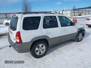 2003 Mazda Tribute ES with VIN 4F2CZ96133KM22960, listed as a IAAI auction lot 41550181 with 159,412 mi miles. Bid and sale history available at carsss.com. Image 4.