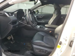 2021 Toyota RAV4 Hybrid XSE with VIN 4T3E6RFV4MU034021, listed as a Copart auction lot 59295175 with 25,500 mi miles and Salvage title. Bid and sale history available at DreamBid. Image 7.