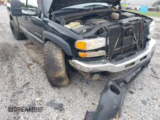2005 GMC Sierra 2500HD SLE z VIN 1GTHK23U75F816621, wystawiony jako IAAI lot #41965293 z przebiegiem 341 770 mil mil oraz . Historia ofert i sprzedaży dostępna na DreamBid. Obrazek 6.
