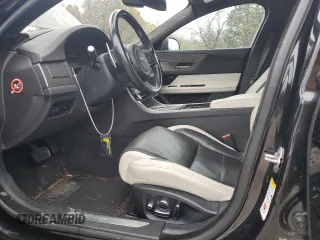 2016 Jaguar XF S with VIN SAJBM4BV0GCY00336, listed as a Copart auction lot 80828124 with 73,577 mi miles and Salvage Title. Bid and sale history available at carsss.com. Image 7.