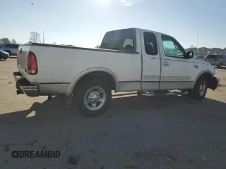 2000 Ford F-150 XL with VIN 1FTRX17L1YNA26050, listed as a Copart auction lot 43597105 with 205,152 mi miles and Salvage Title. Bid and sale history available at carsss.com. Image 3.