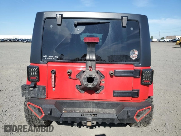 2016 Jeep Wrangler Unlimited Sahara with VIN 1C4HJWEG4GL186000, listed as a Copart auction lot 62554085 with 80,506 mi miles and Salvage title. Bid and sale history available at DreamBid. Image 6.