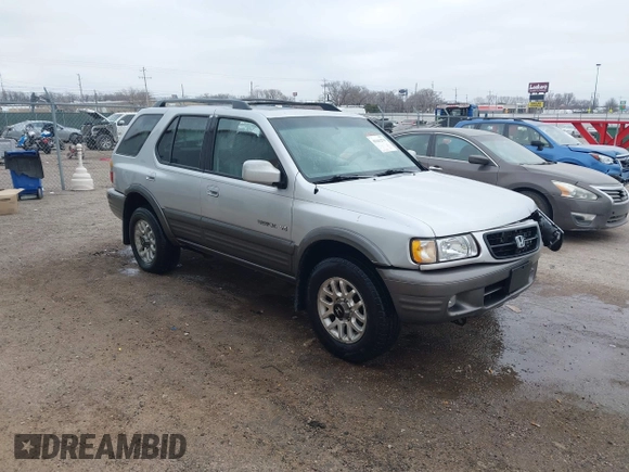 2001 Honda Passport LX z VIN 4S6CK58W714414399, wystawiony jako IAAI lot #41641270 z przebiegiem 203 093 mil mil oraz . Historia ofert i sprzedaży dostępna na DreamBid. Obrazek 1.