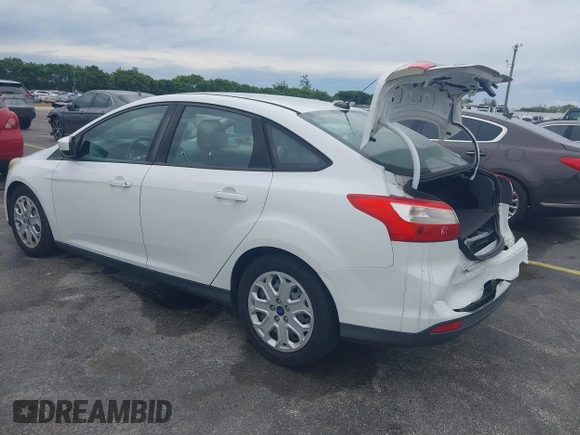 2012 Ford Focus SE with VIN 1FAHP3F25CL239383, listed as a IAAI auction lot 41656033 with 127,011 mi miles and . Bid and sale history available at DreamBid. Image 3.