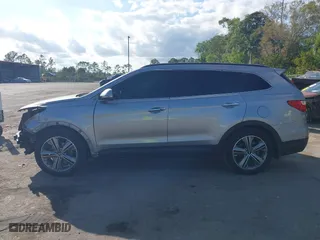 2014 Hyundai Santa Fe Limited with VIN KM8SR4HF0EU072293, listed as a IAAI auction lot 41565281 with 129,727 mi miles. Bid and sale history available at carsss.com. Image 14.