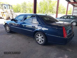 2007 Cadillac DTS Luxury I z VIN 1G6KD57Y17U160951, wystawiony jako IAAI lot #42298405 z przebiegiem 137 899 mil mil oraz . Historia ofert i sprzedaży dostępna na DreamBid. Obrazek 3.