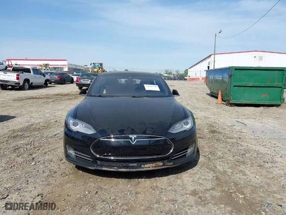 2015 Tesla Model S 85 kWh Battery with VIN 5YJSA1S11FFP79033, listed as a IAAI auction lot 41924740 with NaN miles. Bid and sale history available at carsss.com. Image 13.
