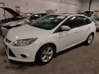2014 Ford Focus SE with VIN 1FADP3F21EL200534, listed as a IAAI auction lot 41942026 with 61,414 mi miles. Bid and sale history available at carsss.com. Image 2.