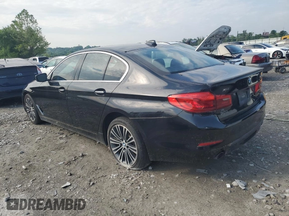 2018 BMW 5 Series 530i xDrive with VIN WBAJA7C55JWA74479, listed as a Copart auction lot 59689085 with 114,329 mi miles and Salvage title. Bid and sale history available at DreamBid. Image 2.