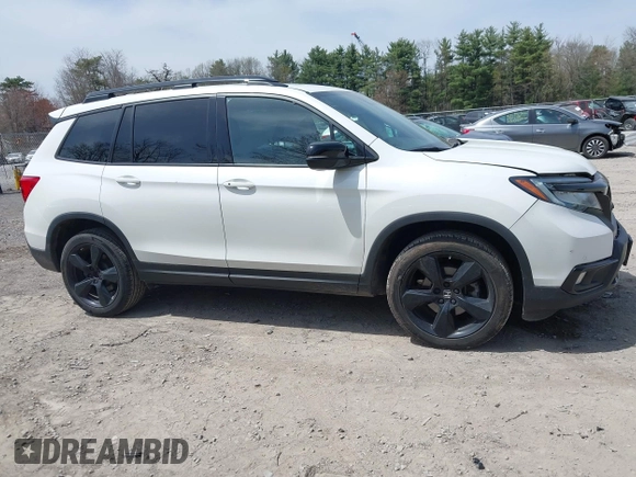 2021 Honda Passport Elite z VIN 5FNYF8H08MB014739, wystawiony jako IAAI lot #42137913 z przebiegiem 50 580 mil mil oraz . Historia ofert i sprzedaży dostępna na DreamBid. Obrazek 13.