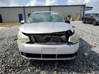 2009 Ford Focus SE with VIN 1FAHP35N09W267059, listed as a Copart auction lot 54155965 with 129,768 mi miles and Salvage Title. Bid and sale history available at carsss.com. Image 5.