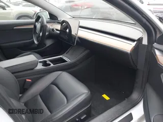 2022 Tesla Model 3 with VIN 5YJ3E1EA7NF108758, listed as a IAAI auction lot 41824437 with Not Provided miles. Bid and sale history available at carsss.com. Image 5.