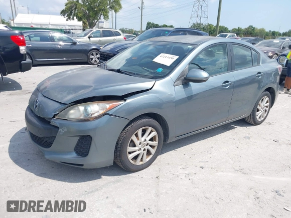 2012 Mazda 3 i Touring with VIN JM1BL1V70C1664809, listed as a IAAI auction lot 42213459 with 331,525 mi miles and . Bid and sale history available at DreamBid. Image 2.