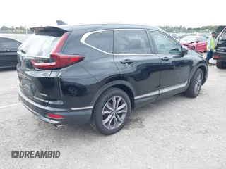 2021 Honda CR-V Touring with VIN 2HKRW1H91MH410751, listed as a IAAI auction lot 41286168 with 56,314 mi miles. Bid and sale history available at carsss.com. Image 4.