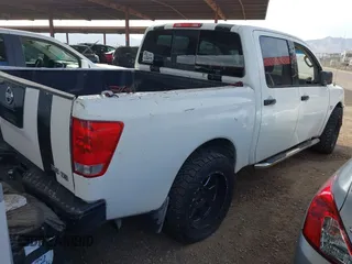 2004 Nissan Titan LE with VIN 1N6AA07AX4N550974, listed as a IAAI auction lot 41540911 with 252,999 mi miles and . Bid and sale history available at DreamBid. Image 4.