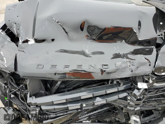 2025 Land Rover Defender with VIN SALEWFFE9S2369515, listed as a Copart auction lot 43980615 with 6,363 mi miles and Salvage title. Bid and sale history available at DreamBid. Image 12.