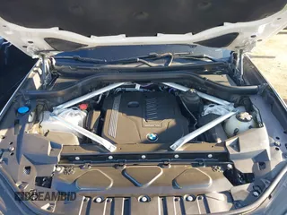 2021 BMW X6 sDrive40i z VIN 5UXCY4C06M9E16162, wystawiony jako IAAI lot #41279040 z przebiegiem 94 494 mil mil oraz . Historia ofert i sprzedaży dostępna na DreamBid. Obrazek 10.