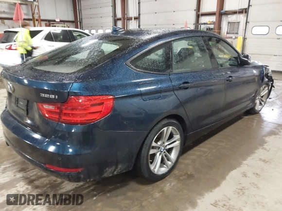 2014 BMW 3 Series 328i Gran Turismo xDrive with VIN WBA3X5C5XED557668, listed as a IAAI auction lot 41728522 with 123,393 mi miles and . Bid and sale history available at DreamBid. Image 4.