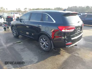 2016 Kia Sorento SX with VIN 5XYPK4A57GG086356, listed as a IAAI auction lot 41803272 with 118,287 mi miles. Bid and sale history available at carsss.com. Image 3.