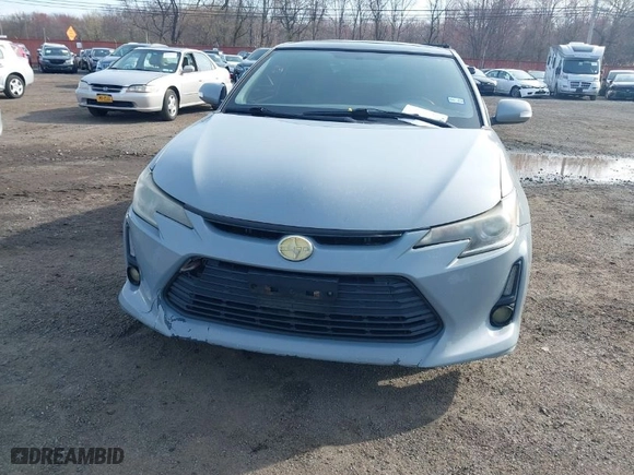 2014 Scion tC with VIN JTKJF5C71E3081033, listed as a IAAI auction lot 41928949 with 144,112 mi miles. Bid and sale history available at carsss.com. Image 17.