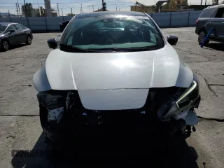 2023 Nissan LEAF SV Plus with VIN 1N4CZ1CVXPC557206, listed as a Copart auction lot 46681545 with 61,179 mi miles and Salvage Title. Bid and sale history available at DreamBid. Image 5.