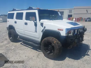 2003 Hummer H2 z VIN 5GRGN23U53H102215, wystawiony jako IAAI lot #42054023 z przebiegiem 222 170 mil mil oraz . Historia ofert i sprzedaży dostępna na DreamBid. Obrazek 1.